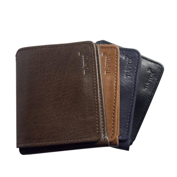 TufTox MagnFold Flap – Classic Black luxury leather bifold wallet with magnetic flap, front view Alt: TufTox MagnFold Flap – Royal Mustard slim leather wallet with flap open showing card slots and ID window Alt: TufTox MagnFold Flap – Inside view showcasing cash compartments and card slots in black leather Alt: TufTox MagnFold Flap – Magnetic flap design with ID window and premium buffalo leather texture Alt: TufTox MagnFold Flap – Wallet placed in belt loop using side slot feature for hands-free carry Alt: TufTox MagnFold Flap – Angled top view of black wallet showing smooth stitching and sleek profile Alt: TufTox MagnFold Flap – Vintage mustard wallet with flap closed, premium finish, and embossed logo Alt: TufTox MagnFold Flap – Gift box packaging showcasing TufTox branding and elegant presentation Alt: TufTox MagnFold Flap – All four colors side by side: Classic Black, Royal Mustard, Vintage Brown, Midnight Blue